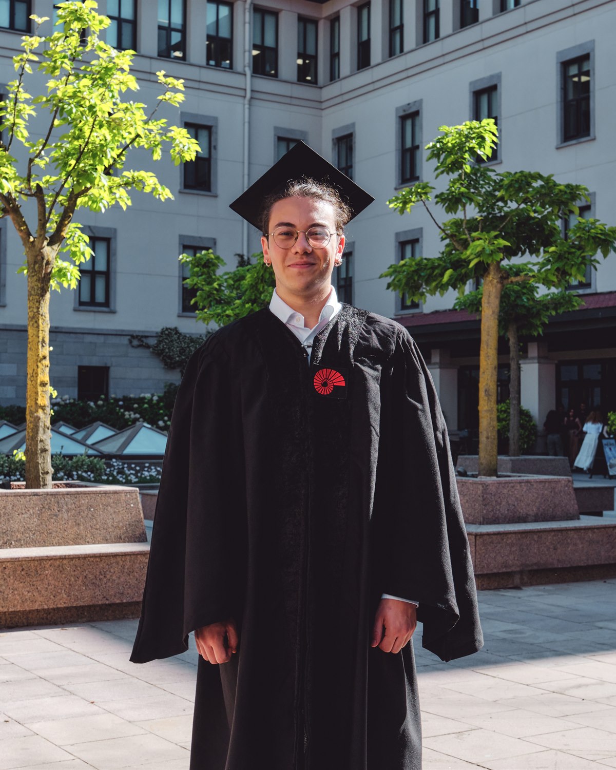 Ege Yiğit Erbil in academic regalia at Koç University in 2026